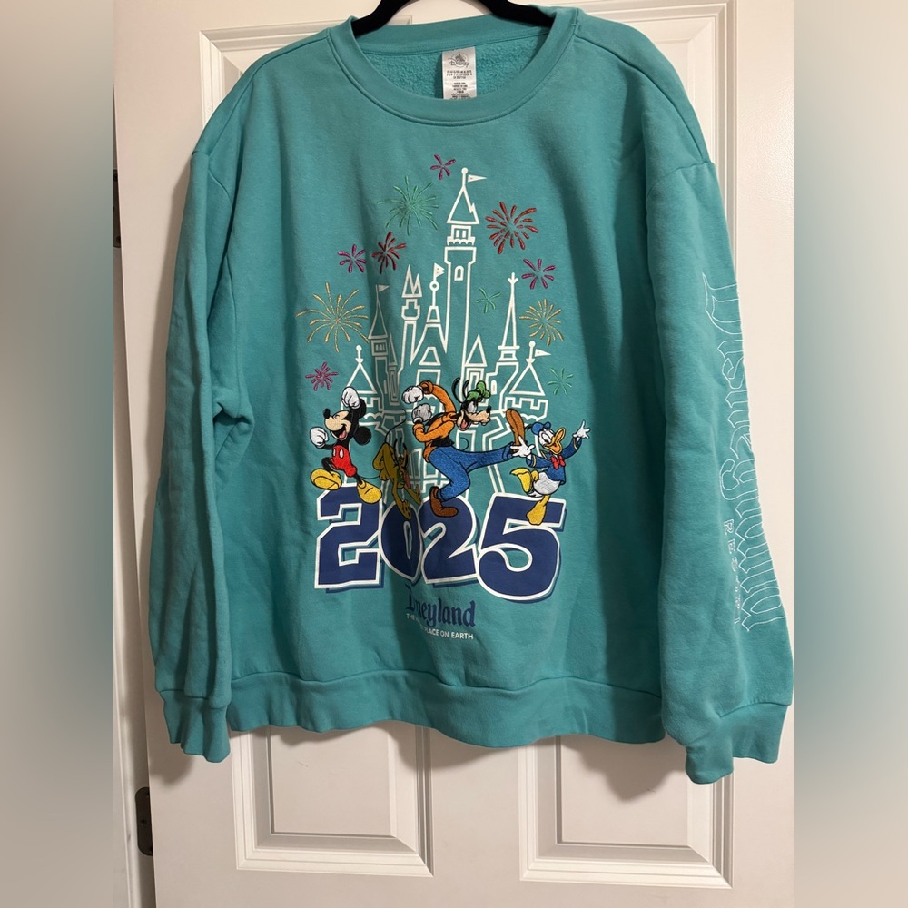 Disney Teal Apparel with Floral Accent